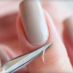trim manicure with scissors