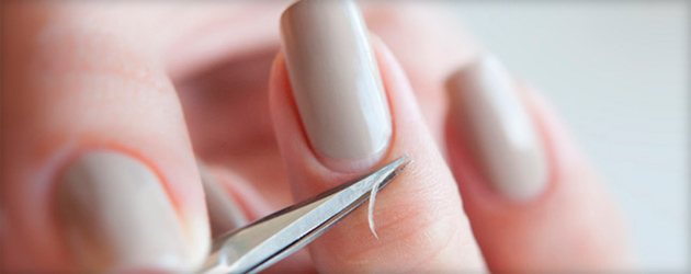 trim manicure with scissors