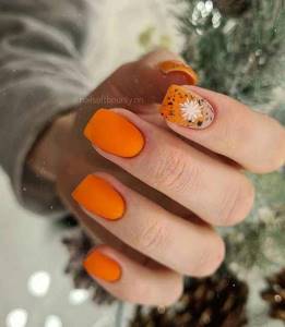 Orange matte manicure