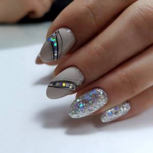 Filing nails with an oval manicure.