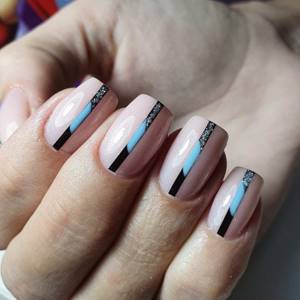 Filing nails with a square manicure.