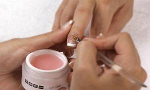 Watch video tutorials for beginners on gel nail extensions.