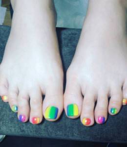 Multicolored pedicure with gradient