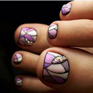 Multi-colored pedicure with stained glass pattern