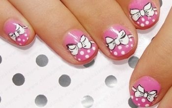 Pink manicure with bows