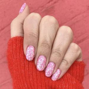pink manicure with white dots