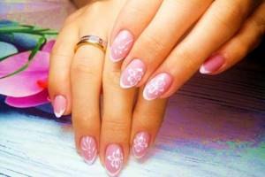 Pink manicure with monograms