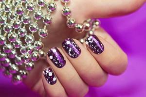 We create our own designs on our nails using shellac