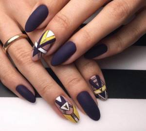 Chic blue matte manicure with a complex geometry pattern.