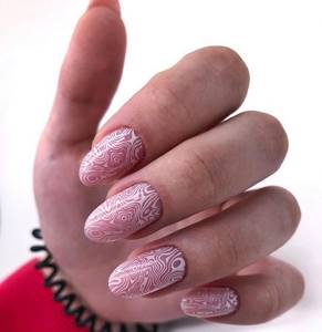 Stamping on almond-shaped nails