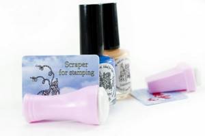 Stamping designs on nails with stamping paint