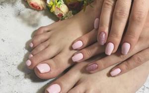 Sophisticated nude manicure pedicure with accent nails