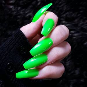 Bright green and acidic shades of manicure