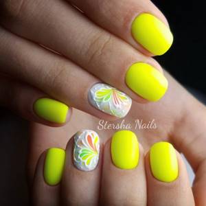 Yellow gel polish on nails