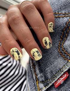 Yellow and black matte manicure