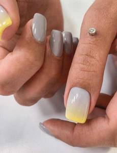 Yellow and gray manicure